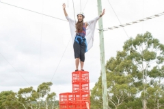 Crate stacking – Use a mix of team work and imagination to build a tower of milk crates and stand on top without losing balance.